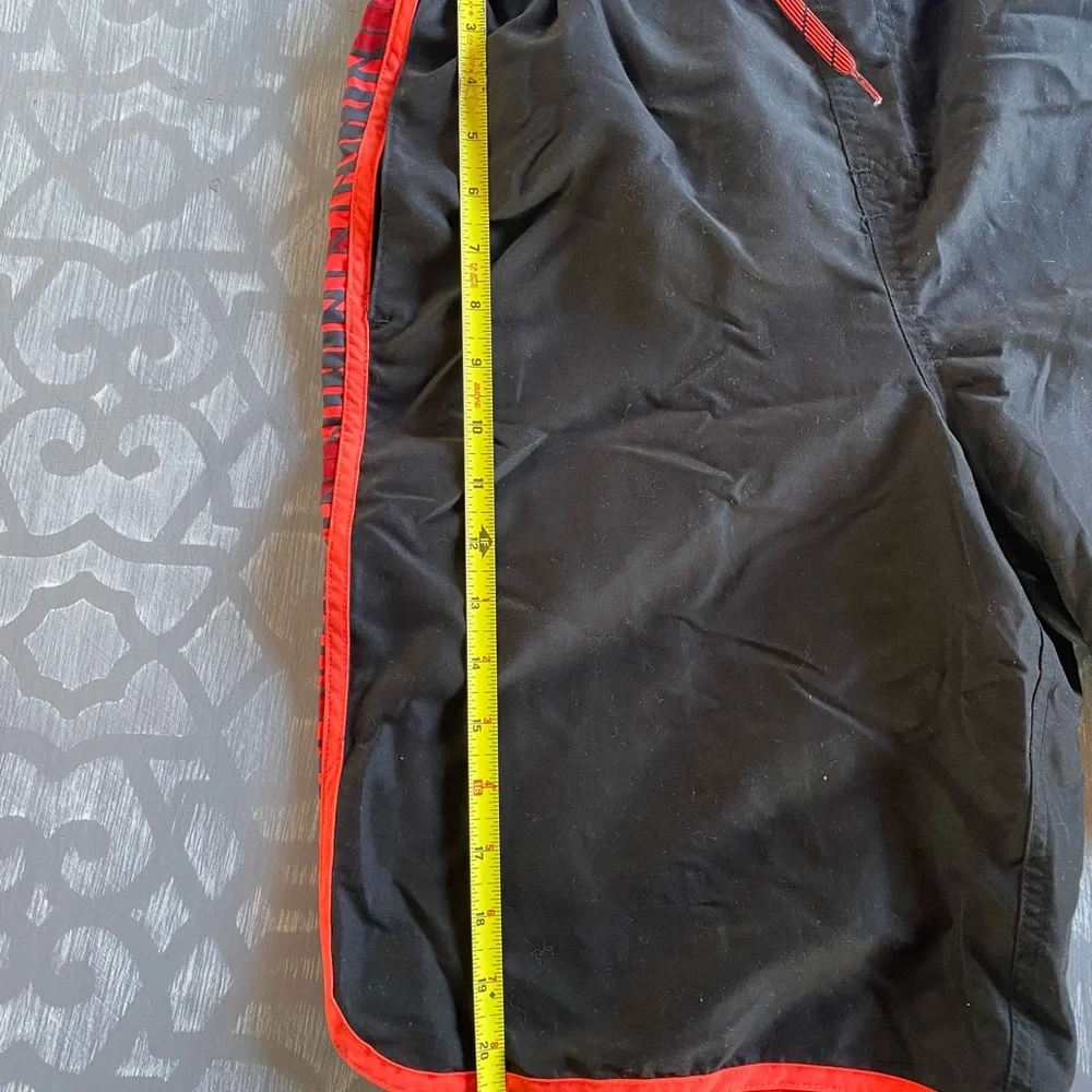 Nike Black and Red‎ lined swim trunks men’s size medium swoosh